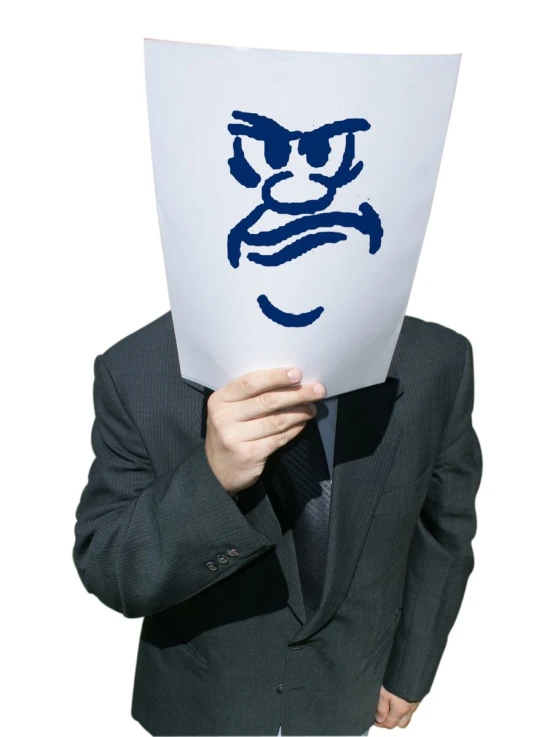 a man in a suit holding a sign with a face drawn on it