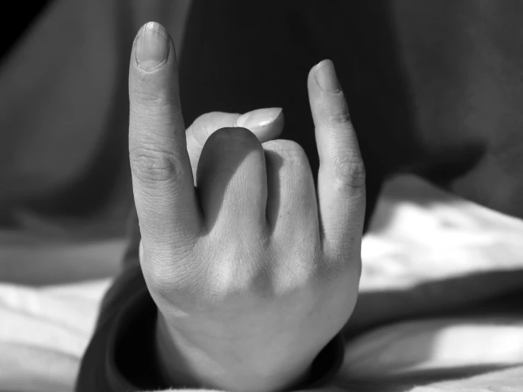 black and white po of a woman's fingers