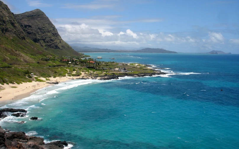 an overview view of a beach and a mountain