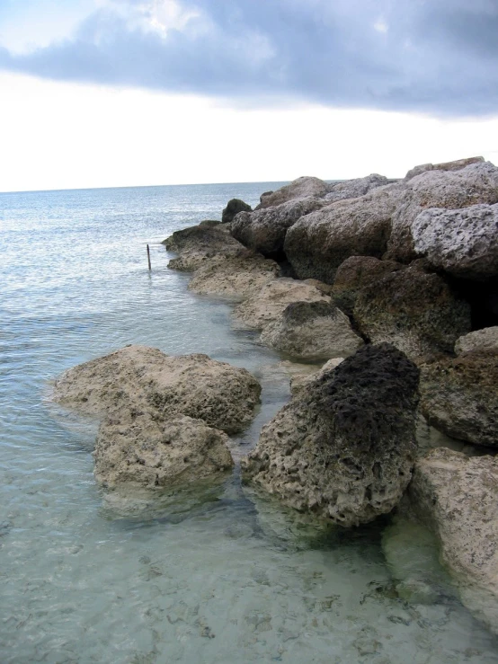 the water is crystal clear with some rocks in it