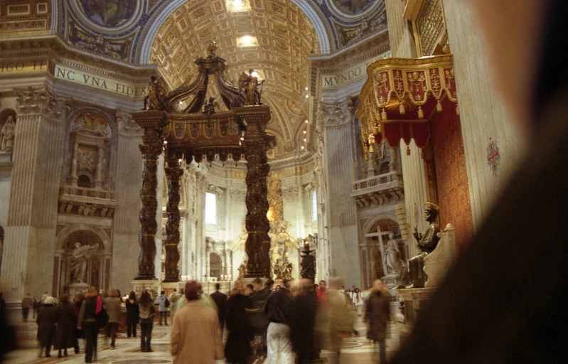 a bunch of people that are standing in the church