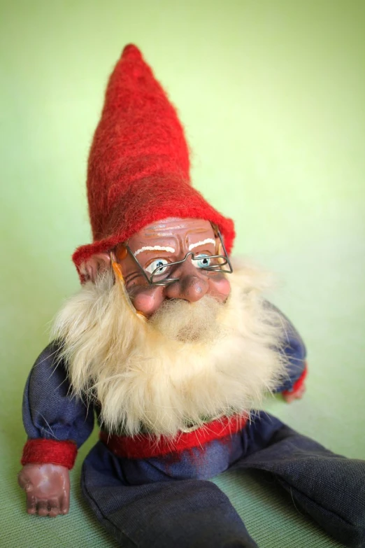 the figure is dressed in a costume of an old man