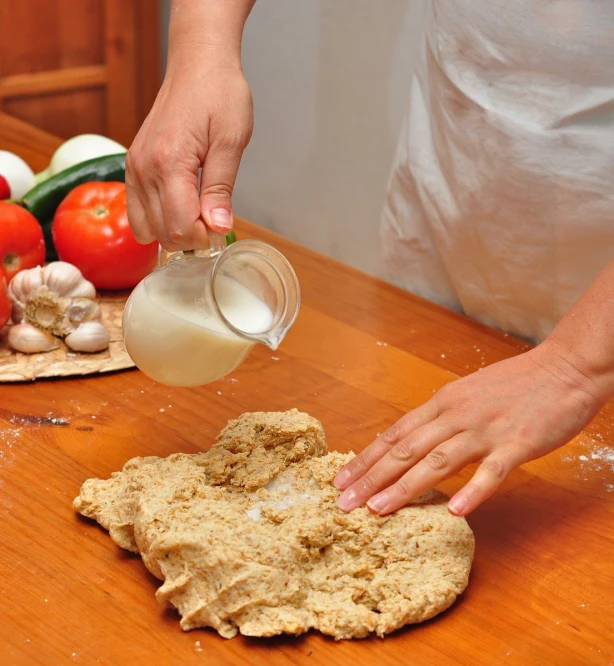 a person is making some kind of dough