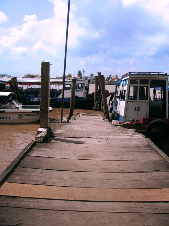 there are several boats sitting at a dock