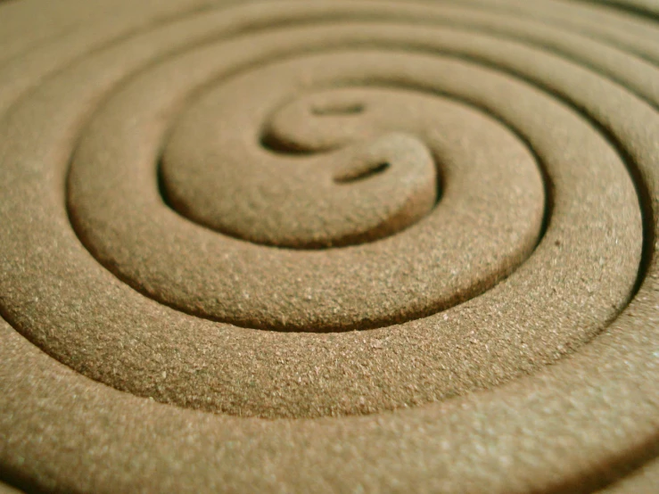 a closeup image of a circular spiral pattern