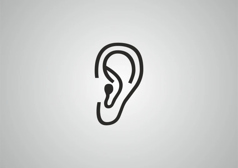 an ear on a grey background