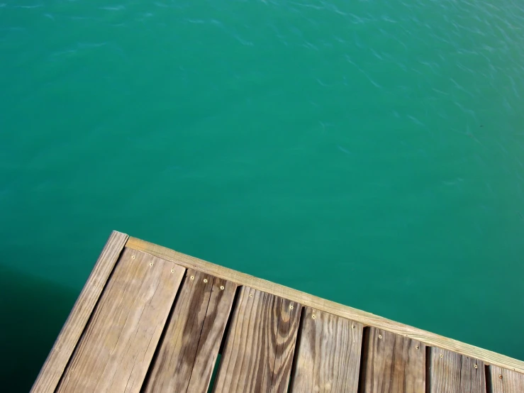 a dock at the edge of a river