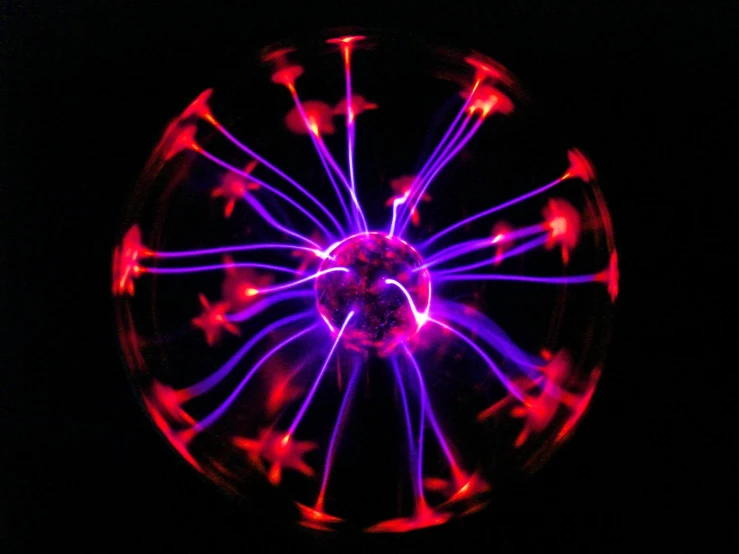 a close up of a ball with colored light