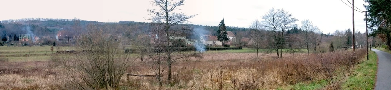 the old house is in the middle of the field