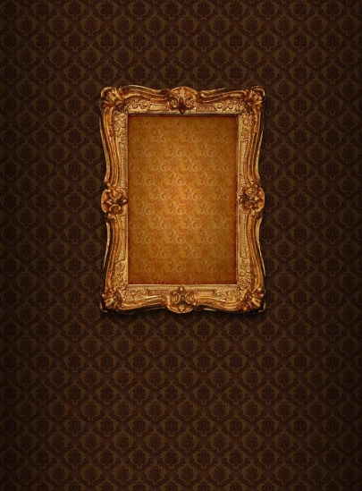 an old ornate golden frame on a brown wall