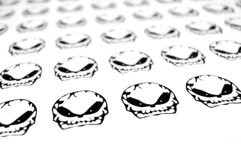 the different stickers show a sandwich with black and white food