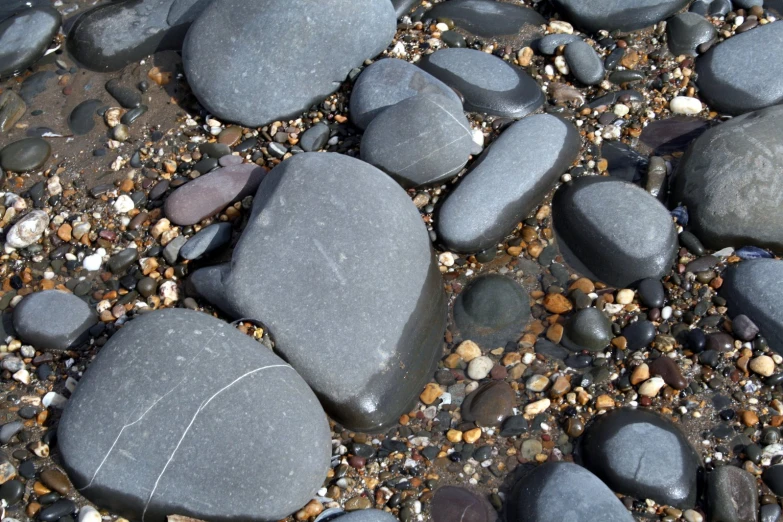 a group of stones sits on the ground