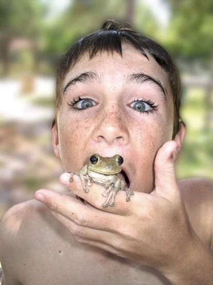 a man with a frog on his nose and eyes