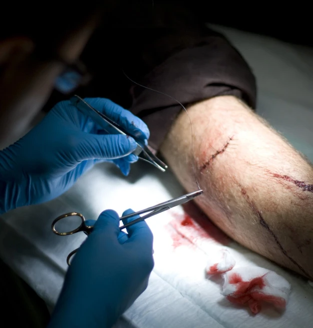 medical personnel performing  on an injured patient