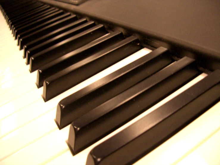 a piano has a lot of black curved bars