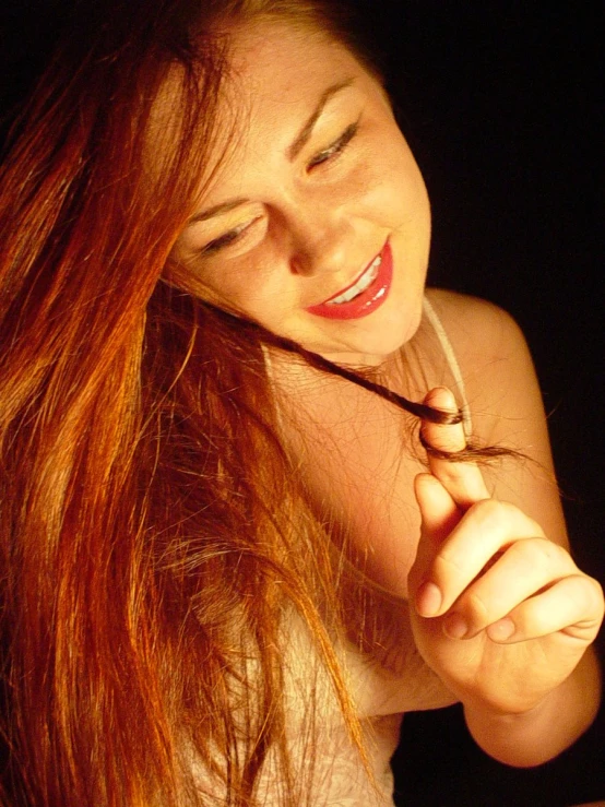 an image of a girl that is brushing her hair