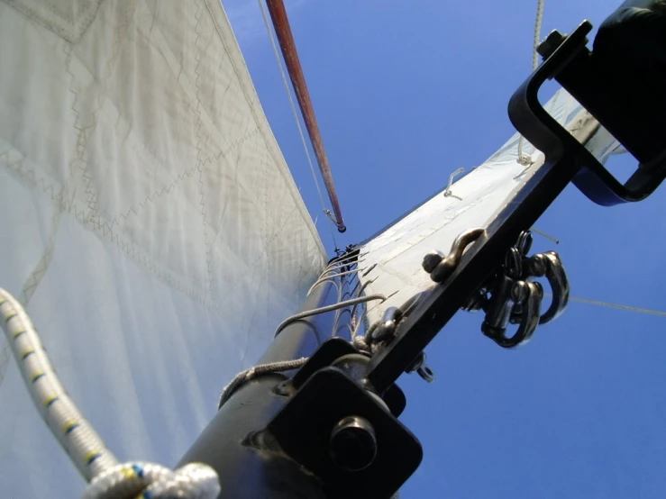 a view looking up from the top of a sail boat