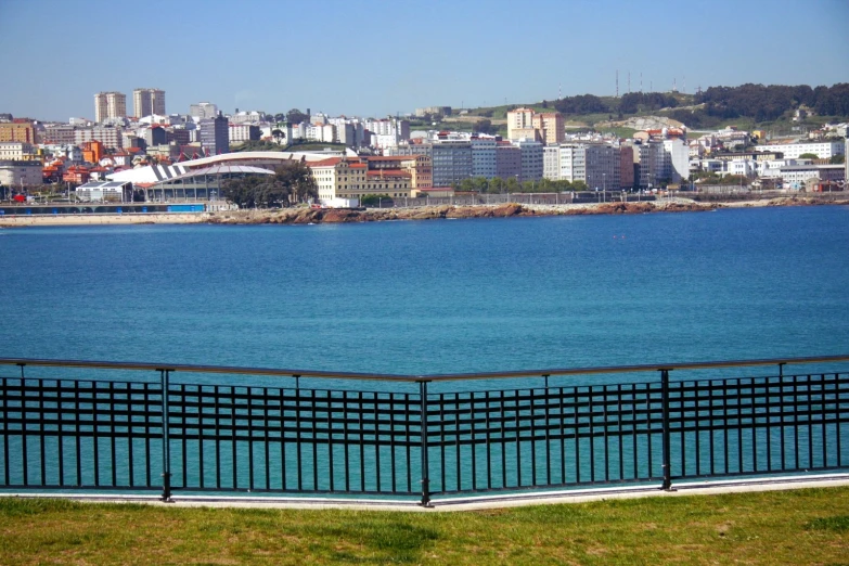 a large body of water surrounded by a city