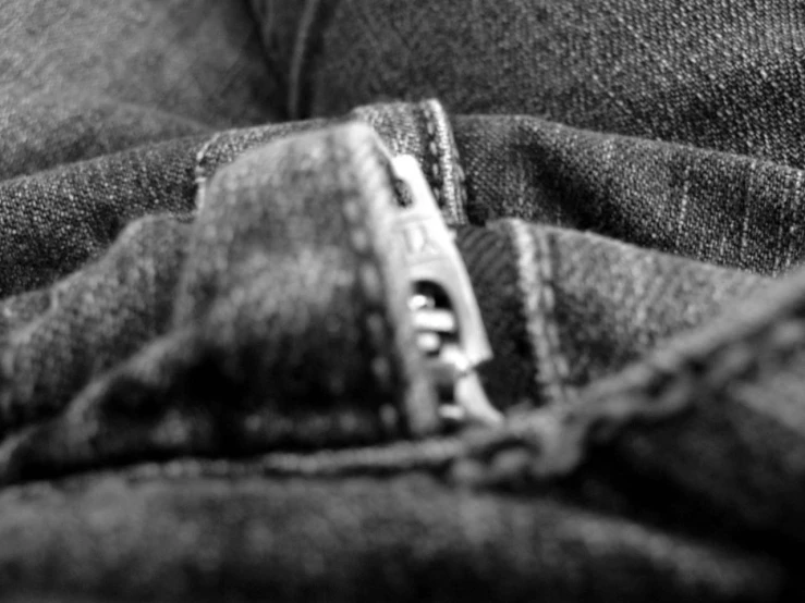 a worn out pocket is seen in black and white