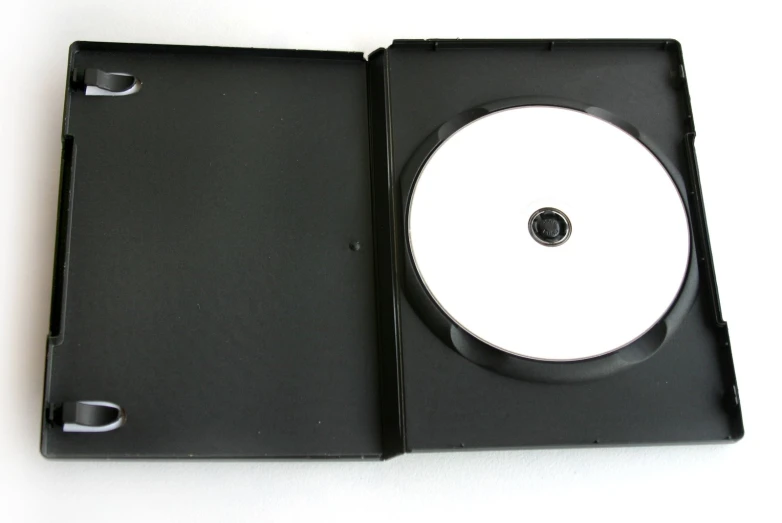 the dvd case is open showing the cd inside