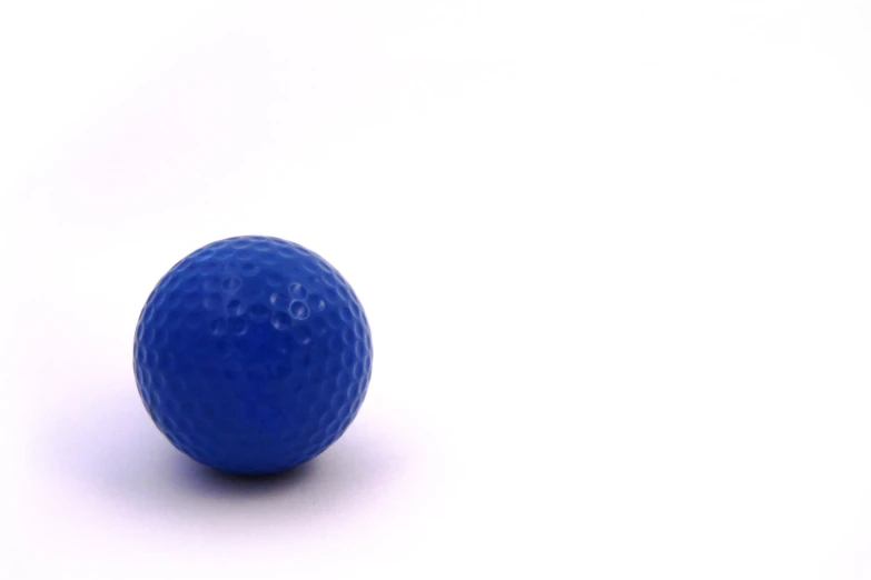 a close up of a ball on a white background