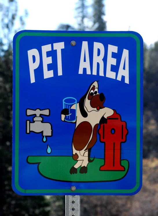 a blue sign warning people to keep their pets in the water