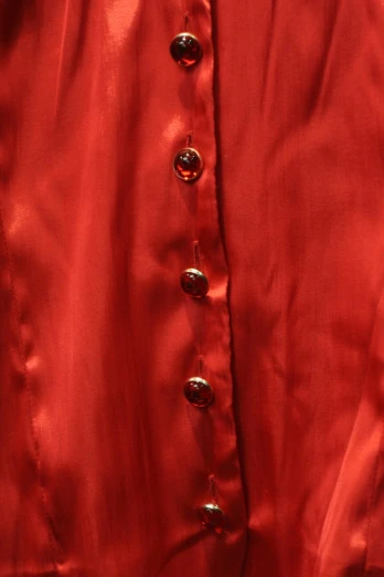 a red dress on display at a show