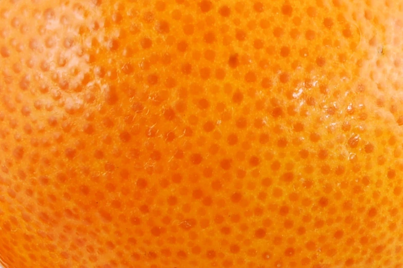 an orange has been placed upside down on a table