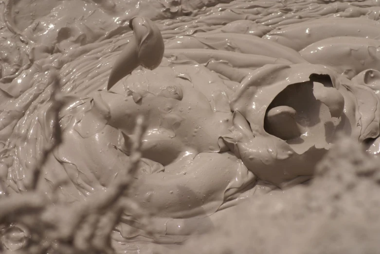 white melted dough and two spoons on the table