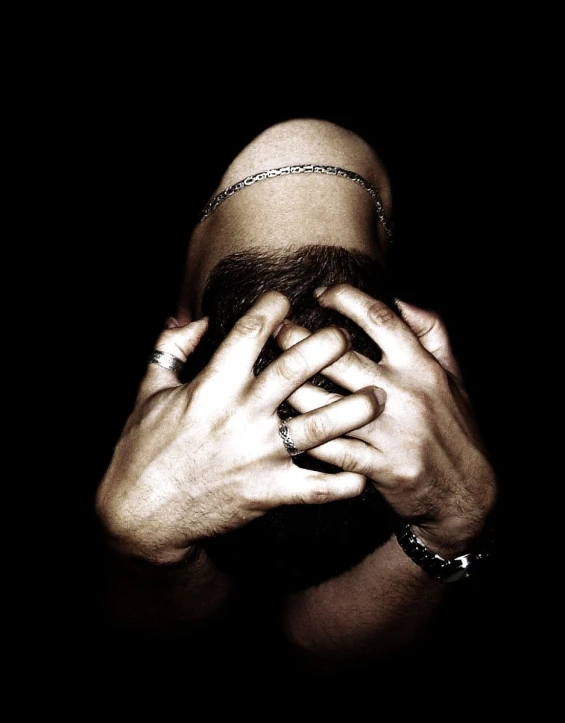 two hands together as the image shows on a black background
