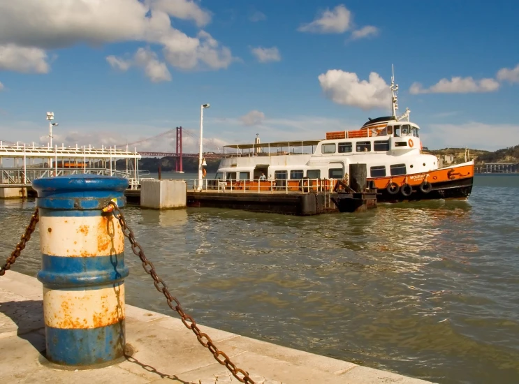 a large boat is docked in the harbor