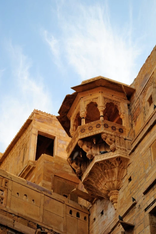 a big building with a tower that has stairs