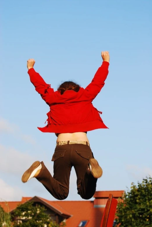 the man is jumping through the air at high altitude