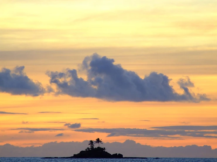 a lone island in the middle of the ocean