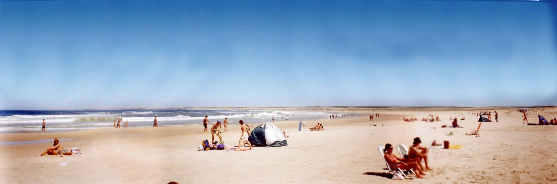 this is an outdoor image of people on the beach