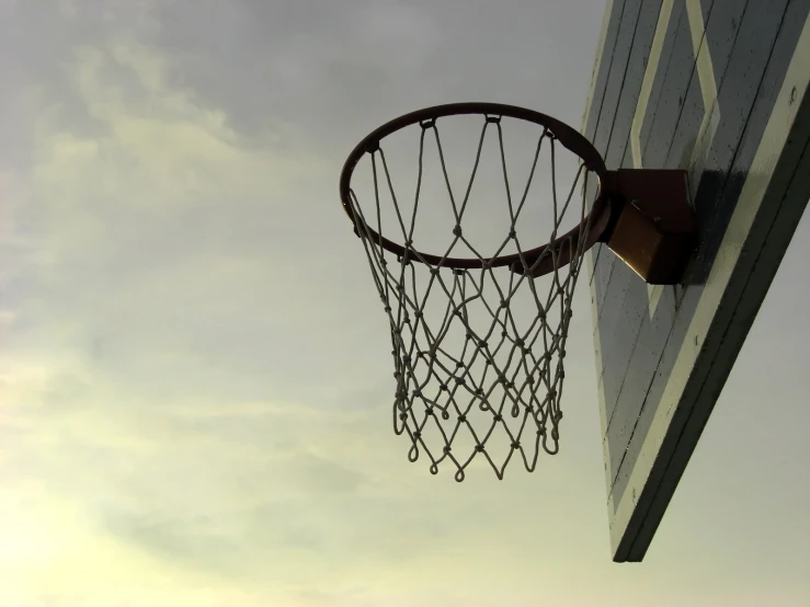 a basketball net attached to the side of a building