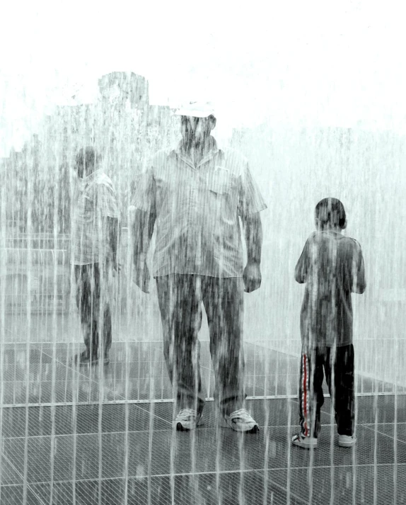 children looking through water in the rain