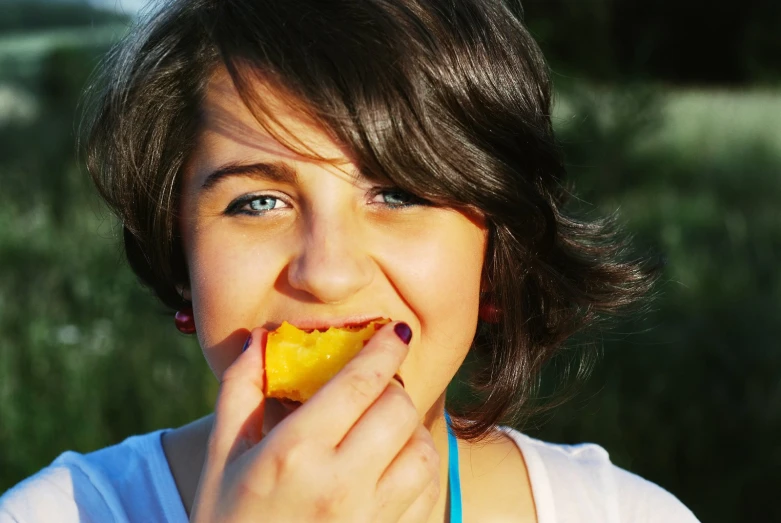 a  is smiling and eating a banana