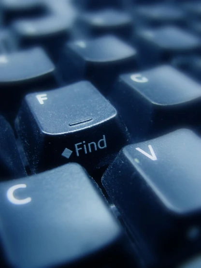 an image of the word find written on the computer keyboard