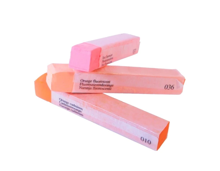 three different flavors of orange, pink and pink wax stick