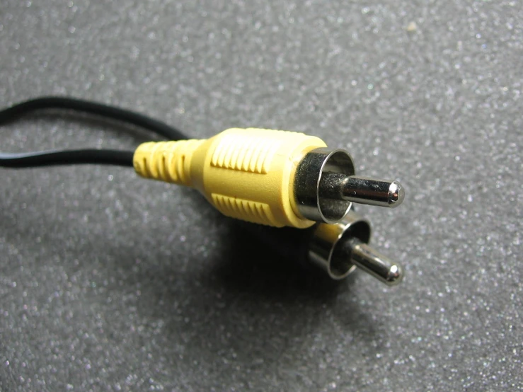 this is an image of a yellow wires with plugs