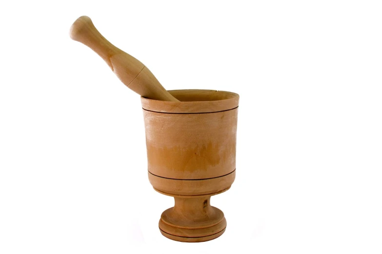 a wooden mortar and pepper mill in its holder