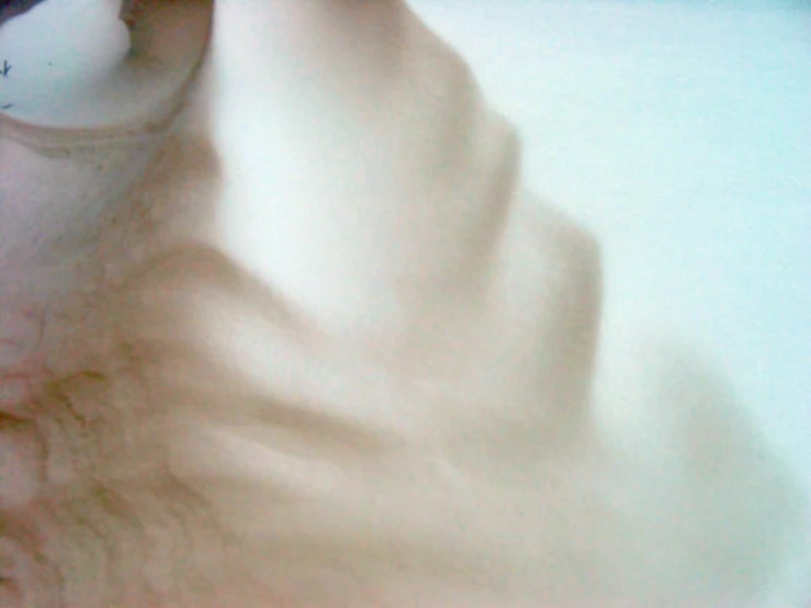 a close up of a woman's hair with wavy hair