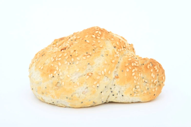 two loaves of sesame seed bread on a white background