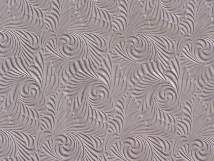 abstract pattern made up of wavy lines in grey and white