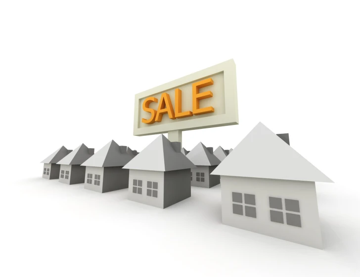 houses are surrounded by a sale sign