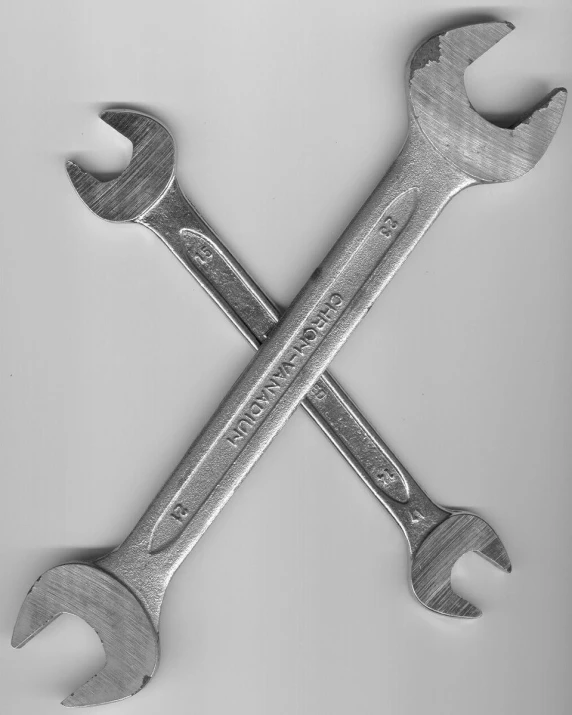 a wrench spanner is shown in this black and white po