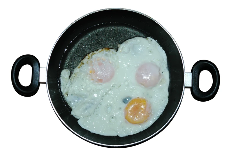 there is two eggs in the frying pan