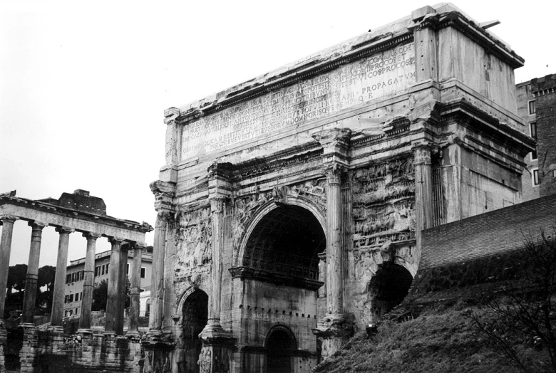 the ruins of a building sitting on the side of the street