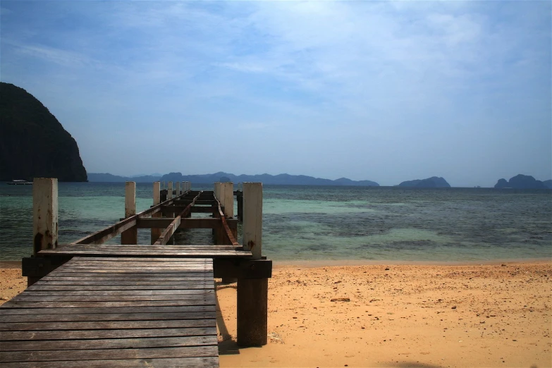 the view from the boardwalk shows an island in the distance